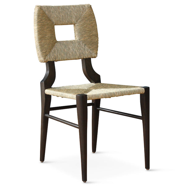 A dining side chair of our iconic handmade How to Marry A Millionaire chair, a reedition of a chair our founder Peter Dunham bought at a Hollywood memorabilia auction and attributed to legendary designer T. H. Robsjohn-Gibbings.
