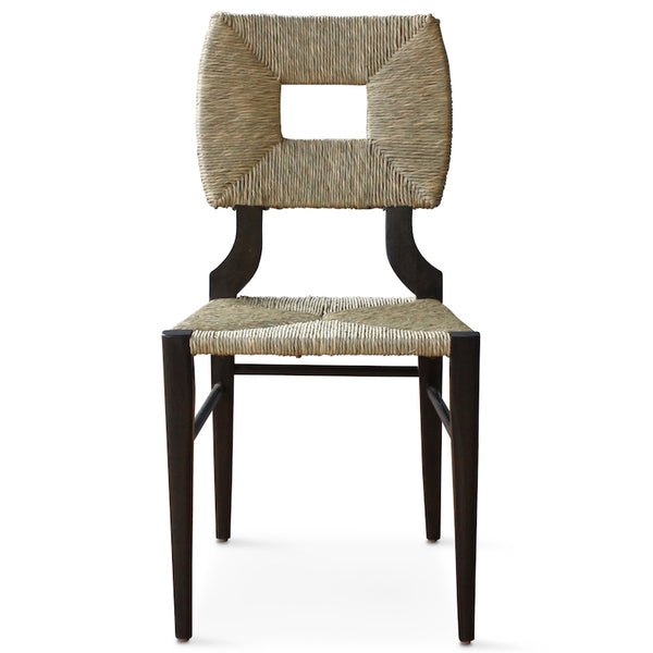 A dining side chair of our iconic handmade How to Marry A Millionaire chair, a reedition of a chair our founder Peter Dunham bought at a Hollywood memorabilia auction and attributed to legendary designer T. H. Robsjohn-Gibbings.
