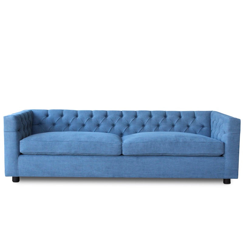 Our beautiful Wormley Sofa was inspired by a 1950s Edward Wormley Sofa, featuring button-tufted details along the back and self-welt seat cushions. It's handmade in Los Angeles with COM (customer's own material).