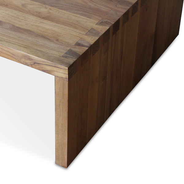 The Dovetail Coffee Table is a large, sturdy table in all teak with a chic, over-sized joinery detail designed by Hollywood at Home founder Peter Dunham. This is part of Hollywood at Home's first-ever in-stock furniture collection. Shipping & handling typically takes 2 weeks from order confirmation. Shipping for the Dovetail Coffee Table is $150 and calculated at checkout.