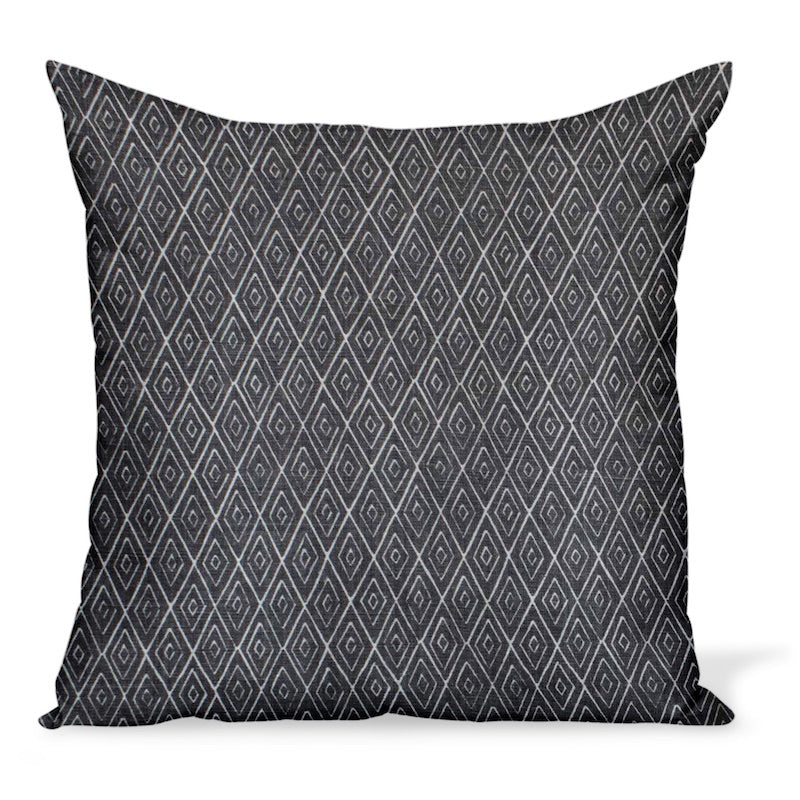 A decorative pillow or cushion made from Peter Dunham Textiles linen tribal print, Atlas in Charcoal
