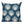 A decorative pillow or cushion made from Peter Dunham Textiles linen tribal print, Bukhara in Blue