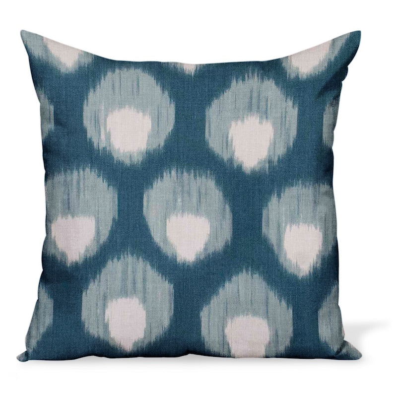 A decorative pillow or cushion made from Peter Dunham Textiles linen tribal print, Bukhara in Blue