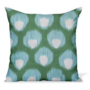 A decorative pillow or cushion made from Peter Dunham Textiles linen tribal print, Bukhara in green/blue