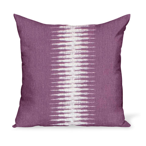 A linen pillow made from a modern take on Ikat in Pasha, a purple colorway, by Peter Dunham Textiles