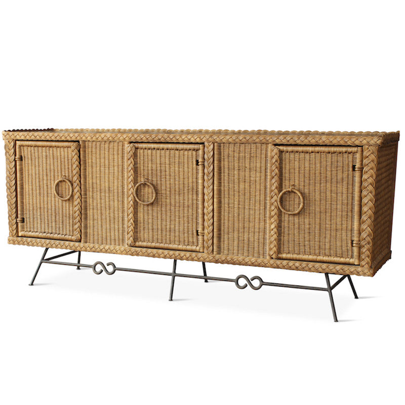 Our wonderful Wicker Credenza is the perfect casual yet chic addition to your living space. It's handmade in Los Angeles and features an iron base, wicker body, braided wicker edges, and a wood top.